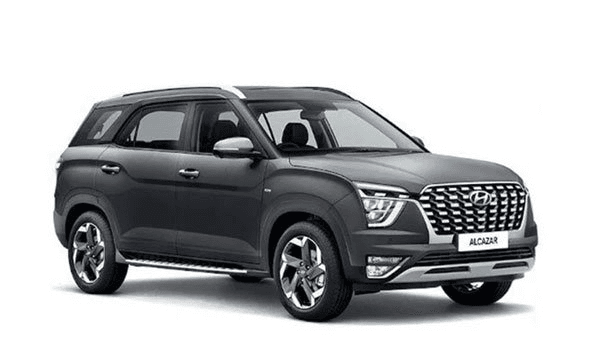 Dark metallic Hyundai Alcazar SUV, front three-quarter studio view