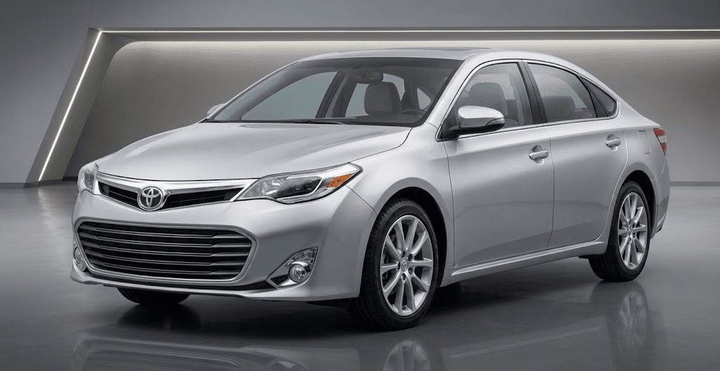 Silver Toyota sedan in a clean studio render, front three-quarter view
